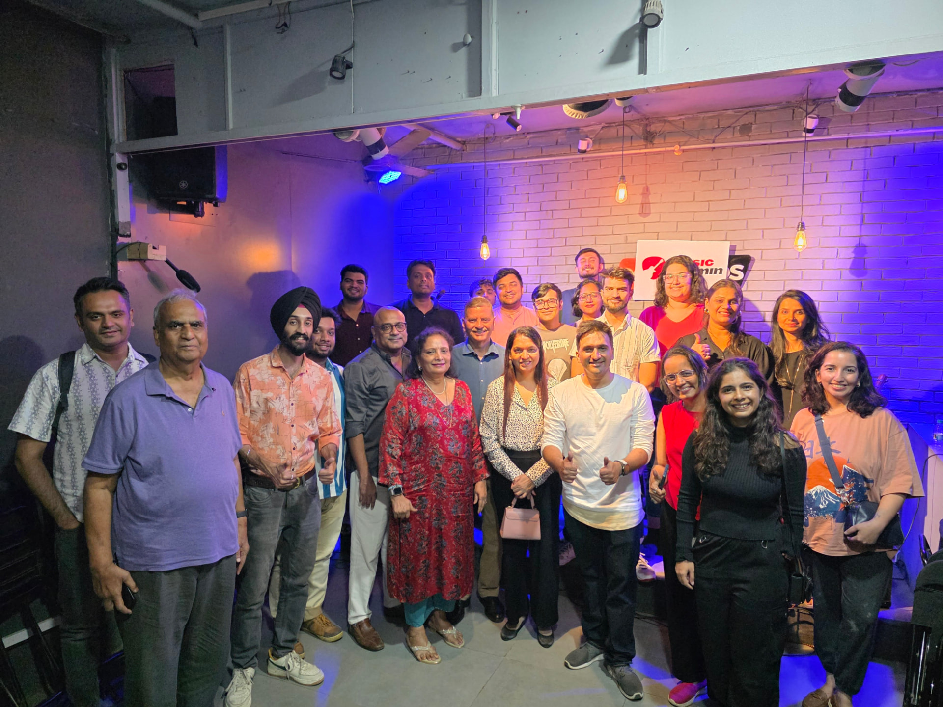 Music Jammin community group photo at a live venue