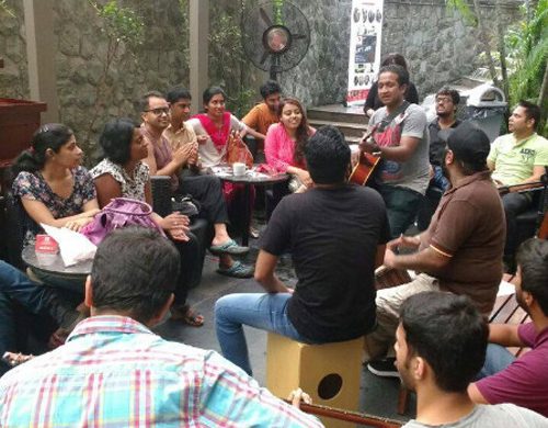 Music Jammin members at an outdoor jam session